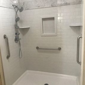 Accessible shower with grab bars