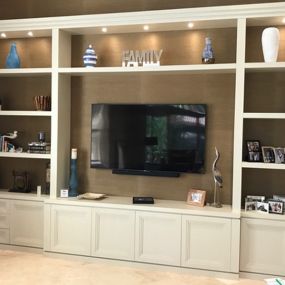 We specialize in creating custom media centers that seamlessly blend style and functionality. Whether you’re looking to showcase your entertainment system, store media components, or create a home theater experience, our expert team can bring your vision to life.