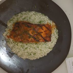 Risotto Parmesan cheese with grill salmon on top