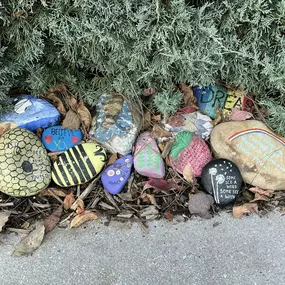 Pasadena Villa Smoky Mountain Lodge: Exterior photo of the front of our residential treatment center's garden area with rocks that our clients painted