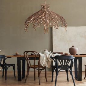 rustic gold chandelier image over dining table