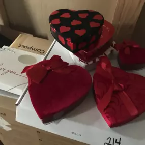 Sapien Designs' Multimedia Studios captured this image of heart-shaped gift boxes, emphasizing their creative setups for SEO digital marketing.