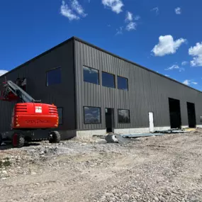 A business partner hired Steel Concepts to construct a versatile building for their client in Rigby, Idaho, ideal for all their industrial storage requirements. This 12,000-square-foot steel frame building stands as a prominent feature within their commercial complex.