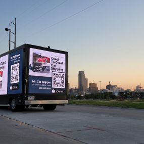 Lead Innovations mobile digital billboard truck in Omaha NE with ad for Mr. Car Shipper