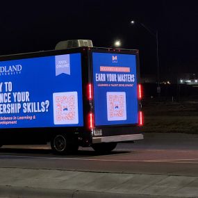Lead Innovations mobile digital billboard truck in Omaha NE with with advertisement for Midlands University