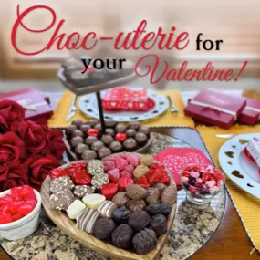 This photograph captures a creative and appealing Valentine's Day chocolate arrangement from Florence's exquisite chocolates, likely taken in their Rexburg, Idaho location. The image promotes a 