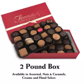 A luxurious 2-pound box of Florence's Exquisite Chocolates, located in Rexburg, Idaho. The box features an elegant assortment of handcrafted chocolates, including caramels, nut-filled pieces, creams, and truffles. Perfect for gifting or indulging in a premium chocolate experience.