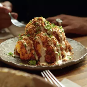 Coliflor asada con tahini y harissa