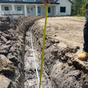 laying pipe for underground electric