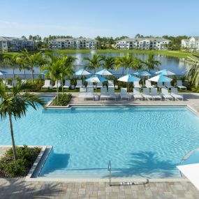 Pool Deck Overlooking Community Lake at Everly Luxury Apartments in Naples FL