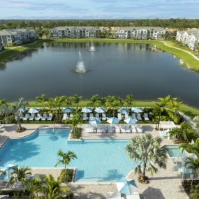 Pool Deck Overlooking Community Lake at Everly Luxury Apartments in Naples FL