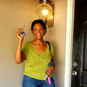 New home owner just receiving her keys in Sacramento