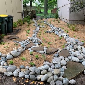 Down to Earth Services eco-friendly landscaping services.  Specializing in native plant landscaping, bioswale, hardscaping, eco-friendly landscaping management.