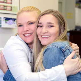 Dr. Jane Simpson, owner and Dentist of Crescent Family Dentistry, and one of her patients