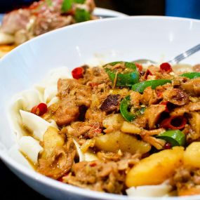 Big Plate Chicken by Kusan Uyghur Cuisine