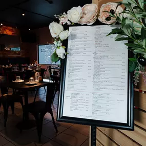 Entrance and menu of Kusan Uyghur Cuisine San Jose California