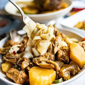 Big Plate Chicken by Kusan Uyghur Cuisine