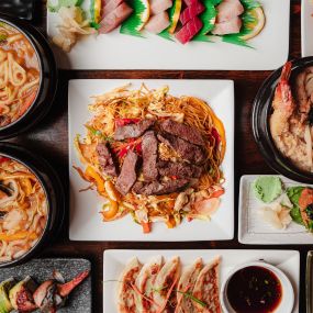 Variety of noodles, soup, seafood, sushi rolls, and gyoza dishes at Wakatobi Japanese Grill Hibachi and Sushi