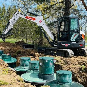 Earthworks handles anything that requires a shovel and machine to move dirt—from septic and sewers, to land clearing, pond installation, basement waterproofing, new build and demolition.