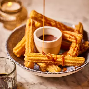 Churros with dulce de leche