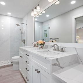 A clean Master Bathroom remodel in white!