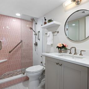Bathroom remodel with pink shower tile