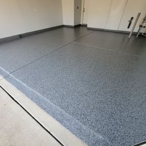 Fabulous garage upgrade with durable epoxy floor, color Nightfall, for our Harrisburg client.