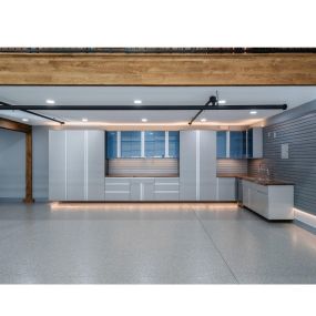A dream garage with sleek design and luxury finishes. This space is perfect to showcase your impressive car collection.