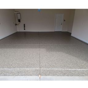 Your garage never looked so good! Create your dream garage with our commercial grade epoxy flooring.