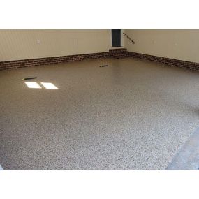 Elevate your garage game with our commercial grade epoxy floors. Say hello to style and durability.