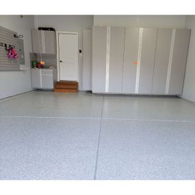Discover how we can transform you garage with beautiful cabinetry solutions and sleek epoxy flooring.