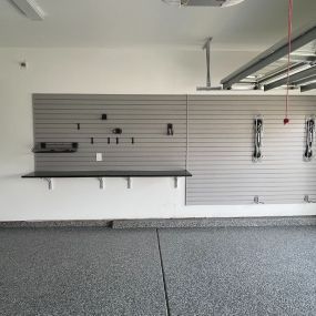 Upgrade your garage with cutting-edge polyaspartic flooring, and sleek slatwall storage!