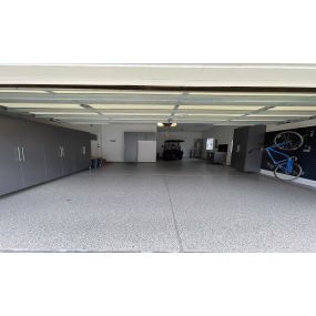 Full Garage Makeover! Our Charlotte client chose custom cabinets with extruded handles, butcher block counter tops and handy slat wall for a ton of storage.