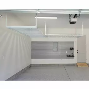 WOW ... A great garage makeover!! From overhead storage racks & slatwall, to commercial grade epoxy floors.