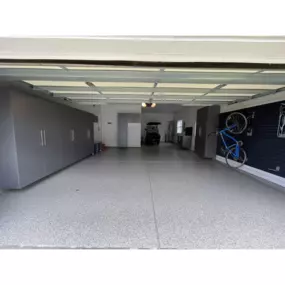 Full Garage Makeover! Our Charlotte client chose custom cabinets with extruded handles, butcher block counter tops and handy slat wall for a ton of storage.