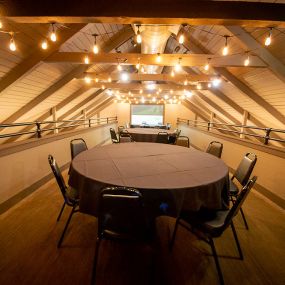 Looking for halls to rent? For spectacular events, our loft, which is the original hay loft, is an ideal venue for up to 50 guests. Tables are arranged under a canopy of Edison bulbs and the backdrop is sweeping views of the lush surrounding valley and the restaurant below.
