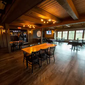 Dining underneath the soaring 30-foot rough-hewn, wood-beamed ceilings is a unique experience with a country-chic vibe. All of our tables are hand-crafted with live edges. No two are the same!