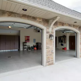 Transform your garage with protective garage floor coating, garage cabinets, overhead storage, garage lighting and more—and make your garage a true extension of your home. Encore Garage Ohio helps homeowners rethink this multipurpose space, revamping a messy garage into a clean, organized space.
Our garage renovation experts—full-time specialists (no part-time or seasonal employees)—install advanced epoxy floor coating systems, sturdy garage cabinetry and versatile wall and ceiling storage syste