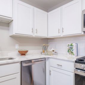 Kitchen With White Cabinetry and Stainless Appliances