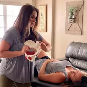 Dr. Chelsea Harkins explaining a technique to a patient