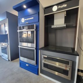 appliance showroom with built in ovens on display