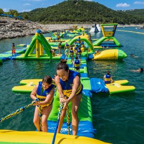 Our massive floating Challenge Course and Water Park offers something for people of all ages to enjoy.