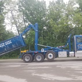 Dumpster truck for your rental.