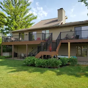 Beautiful raised composite deck with black railing