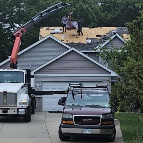 Boom Truck for roof loading of shingles