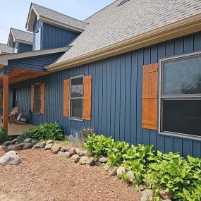 New vinyl siding anmd wood shutters