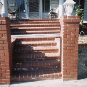 concrete steps, concrete pavers, concrete red brick post, retaining walls