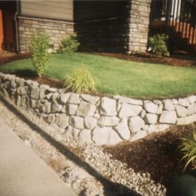 rock wall, rock retaining wall, white rock wall, white rock retaining wall