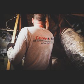 Canyon State installer in customer attic