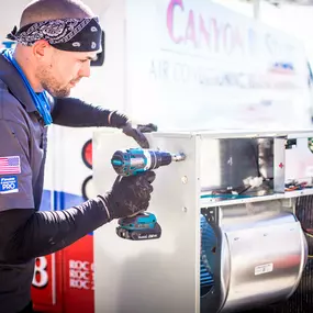 Canyon State install team member assembling HVAC equipment